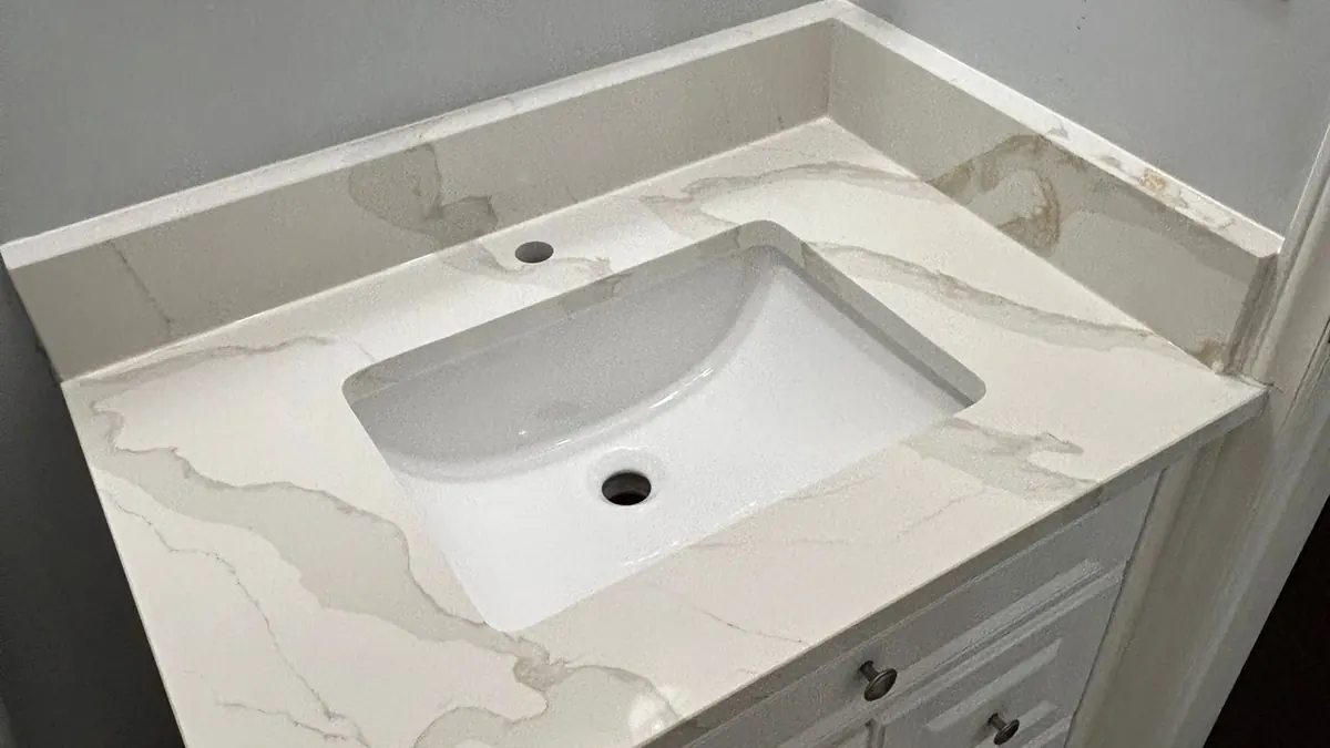 Quartz bathroom vanity top with an undermount sink