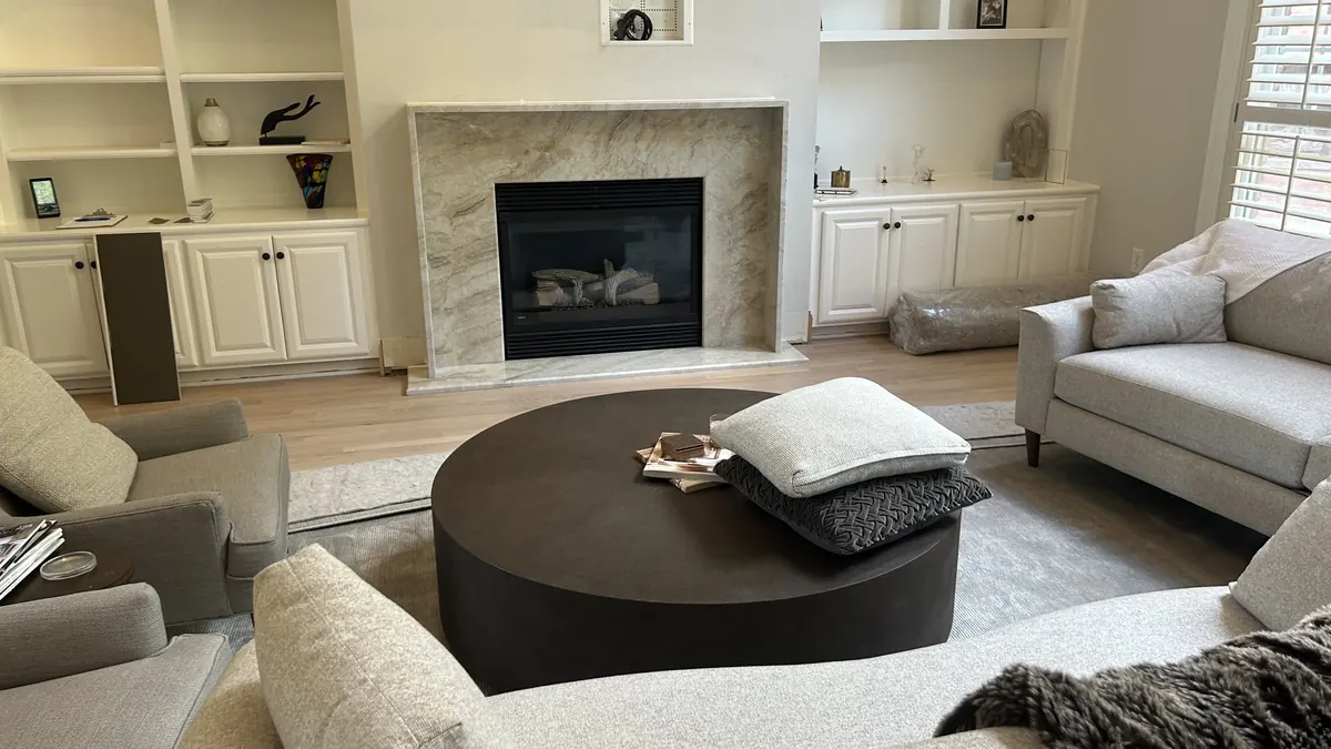 Stone fireplace surround in a living room