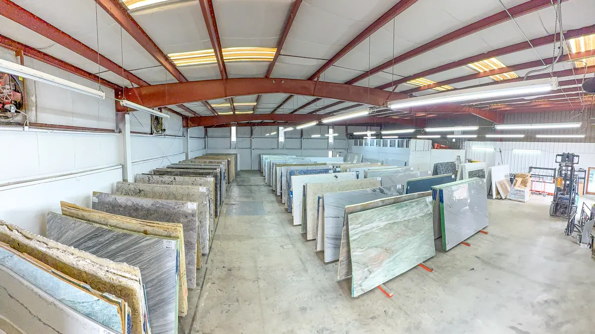 Rows of natural stone slabs in the Cornerstone slab yard