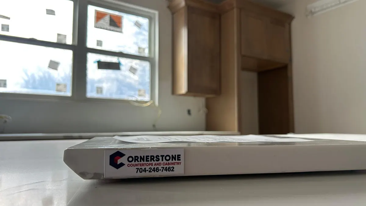 Cornerstone label on a newly installed white countertop