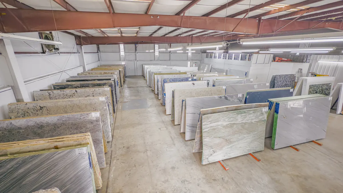White natural stone slabs in the slab yard