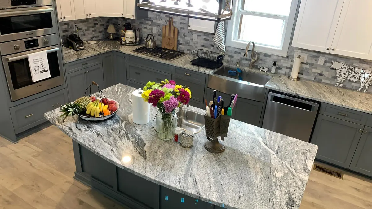 Kitchen island topped with a dramatic white and gray natural stone