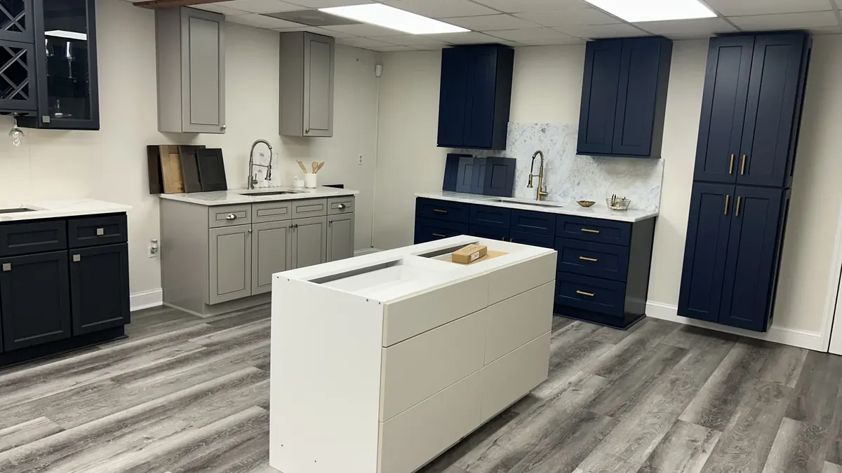 Showroom kitchen display with cabinets and an island