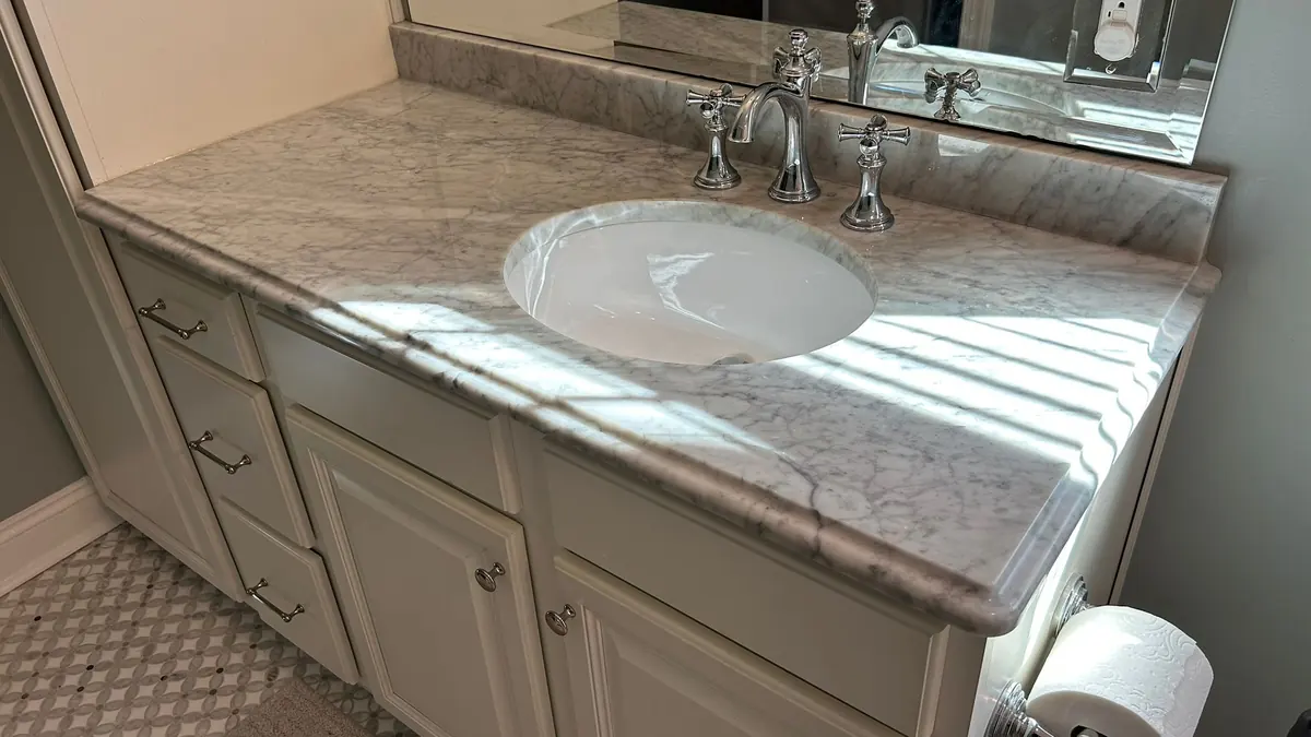 New stone top with an oval sink on an existing bathroom vanity