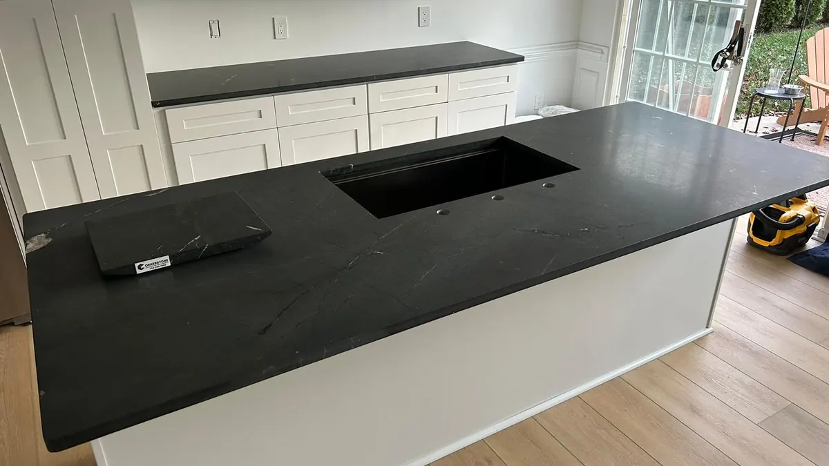 Dark matte stone countertop on a kitchen island