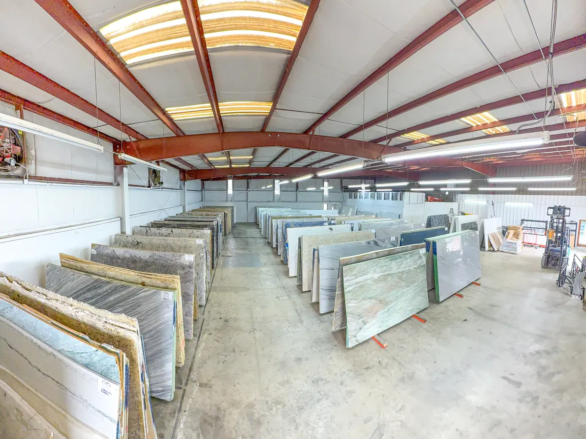 Rows of granite, quartzite and marble slabs in the Cornerstone slab yard in Charlotte