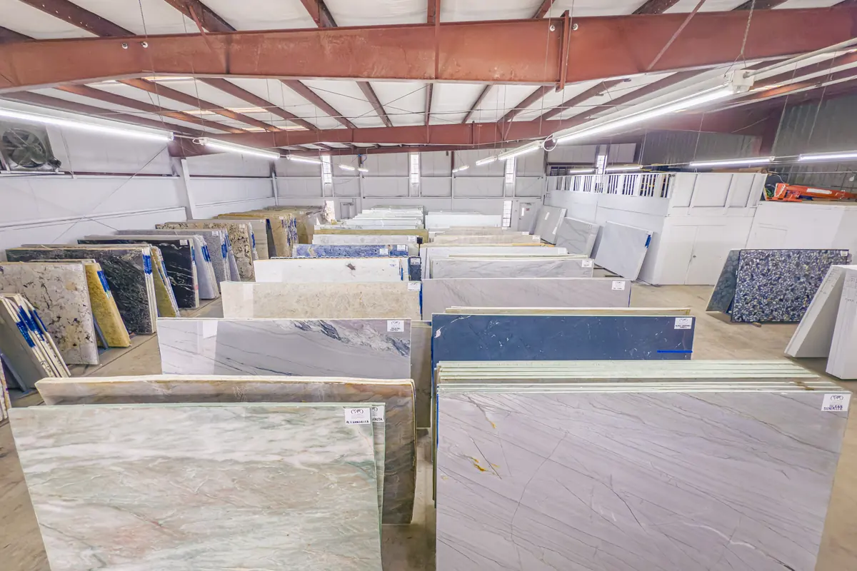 White stone slabs standing in the slab yard