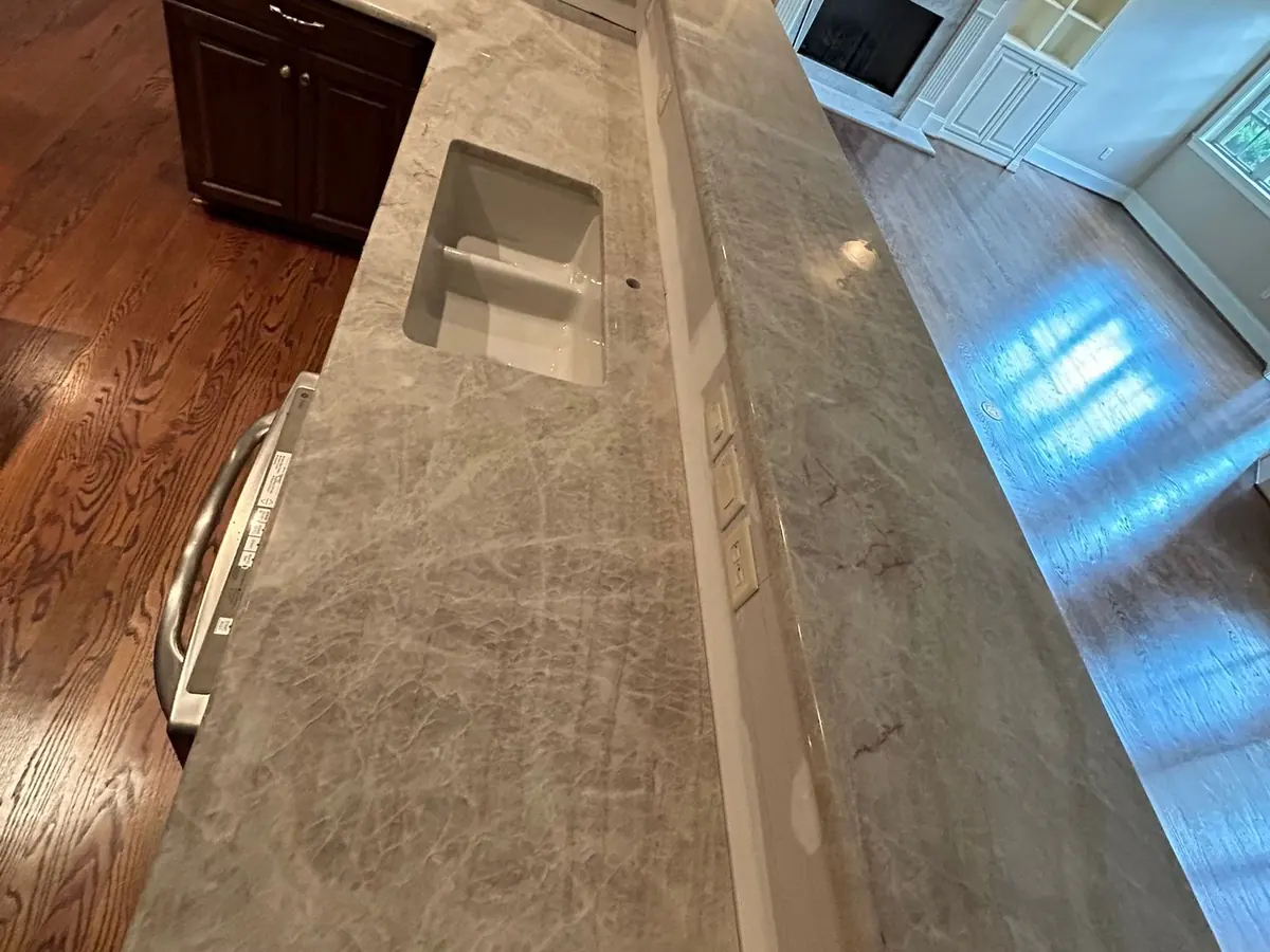 Light quartzite countertop with flowing taupe and gray veins