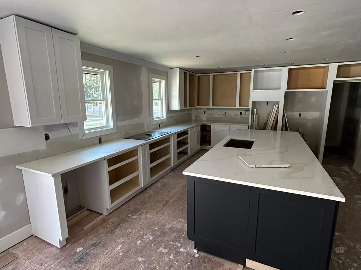 New cabinets installed with the island countertop already in place