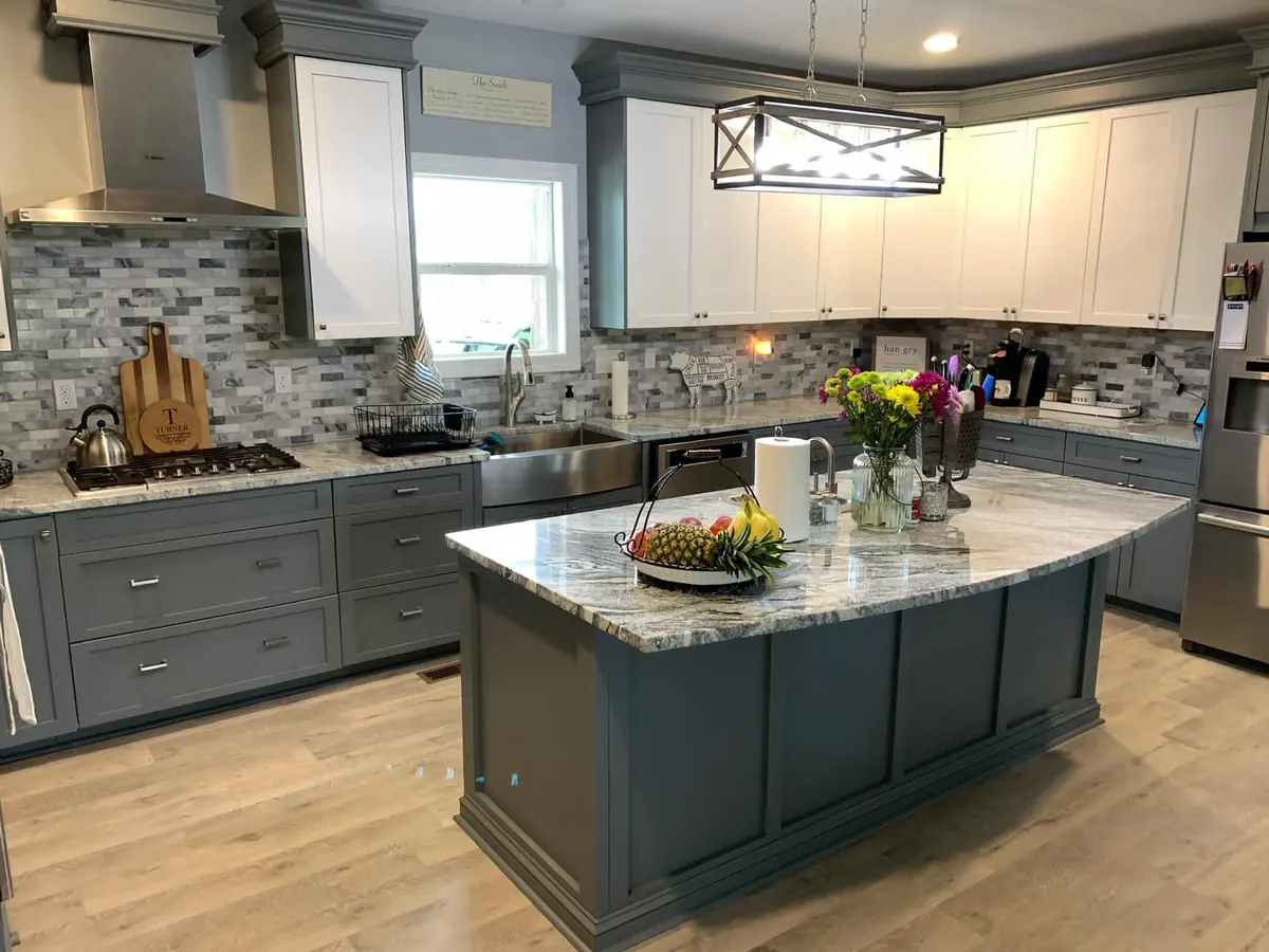 Kitchen with new granite countertops on the island and perimeter