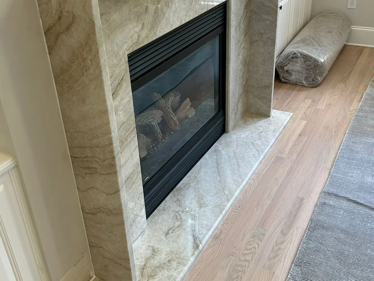 Natural stone fireplace surround and hearth