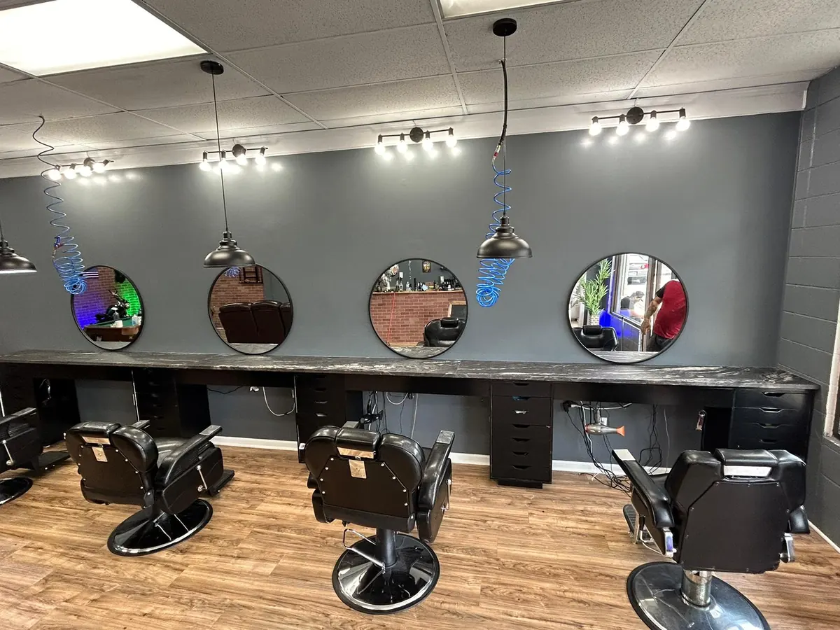 Barbershop stations with stone countertops