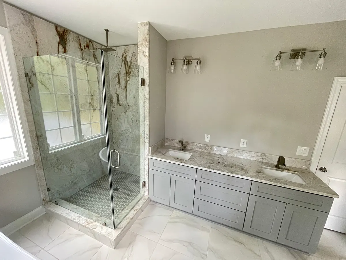 Shower with stone wall panels